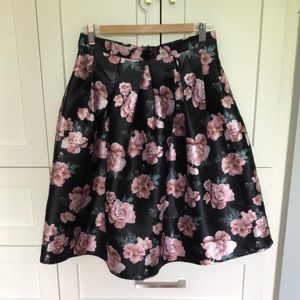 Poofy, floral, knee length skirt.